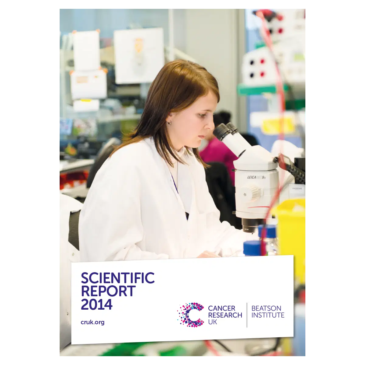 A young woman in a white lab coat works in a laboratory, focusing on a microscope. Text overlay reads: Scientific Report 2014, Cancer Research UK Beatson Institute, cruk.org.